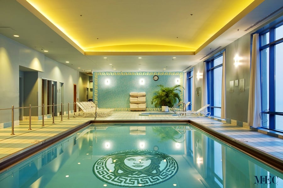 Custom Pools MEC | Versace medallion pool tile pattern design. The image is showing Versace themed swimming pool.