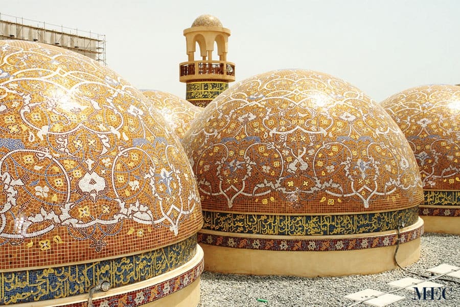 Handcrafted glass mosaic artwork designed by MEC artists. It includes mosaic calligraphy, luxurious 24k gold leaf on Katara mosque domes in Doha.