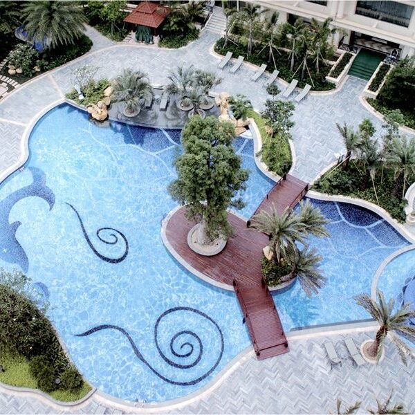 Pool Mosaics MEC | Abstract dolphin and curly scrolls pool.