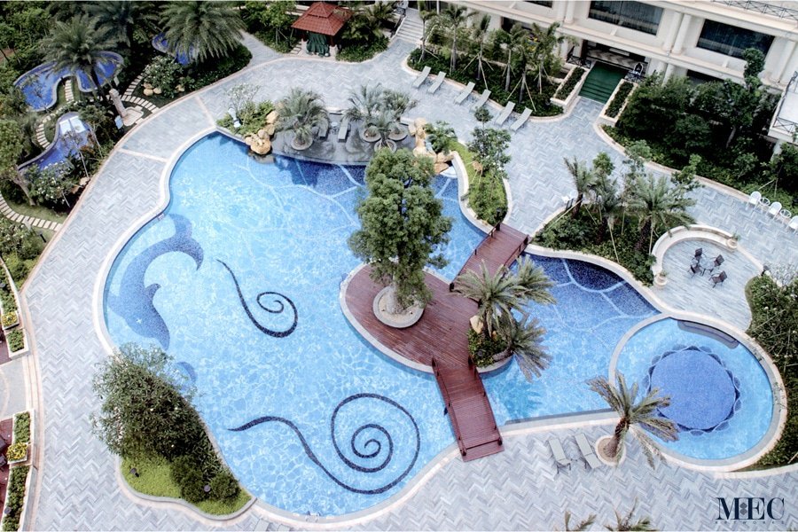 Pool Mosaics MEC | Abstract dolphin and curly scrolls pool.