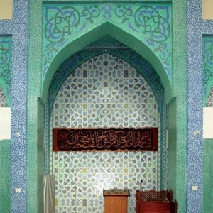Mehrab niches adorned with turquoise and blue Moroccan mosaic tile design