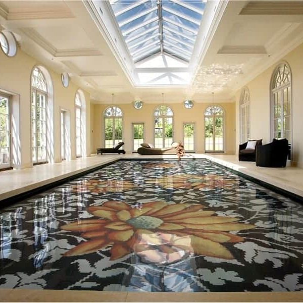 Bold black and white floral swimming pool in murano glass with large fiery orange flowers by MEC.