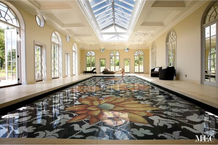 Bold black and white floral swimming pool in murano glass with large fiery orange flowers by MEC.