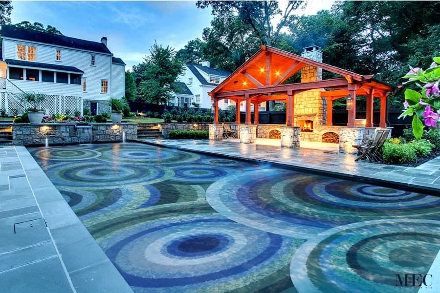 Custom Pool Mosaics by MEC | Vibrant concentric overlapping circles glass mosaic swimming pool.