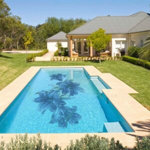 Custom Pools by MEC | Pool featuring a spellbinding lily flowers in murano glass tiles.