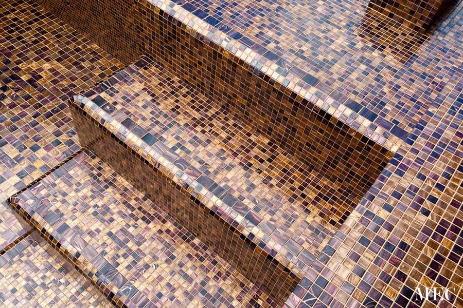 A rich brown glass mosaic tile blend with MEC’s glittery gem glass for pool step tile series.