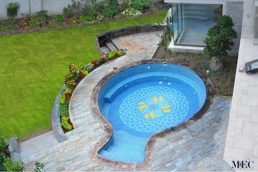 Custom Mosaics by MEC | Wonderful Yellow & Blue glass mosaic tile design in an outdoor Jacuzzi.