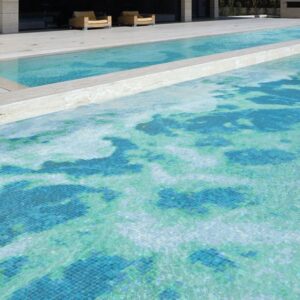 Custom Mosaics by MEC | Glass mosaic pool tile art minicing sandy shallow waters in bluish green textures