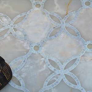 Custom Mosaics by MEC | Handcrafted with marble mosaic, loop and twist splendidly around Water jet cut onyx.