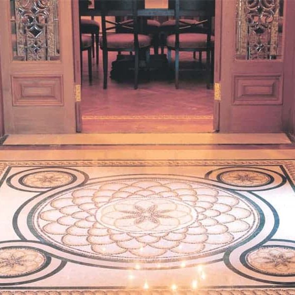 Custom Mosaics by MEC | Marble mosaic rug featuring an infinity loop with floral centres and a marvellous border pattern.
