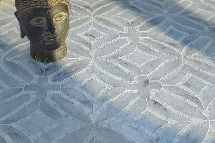 Custom Mosaics by MEC | Water jet marble floor features geometrical patterns and diamonds with a hint of smooth curves.