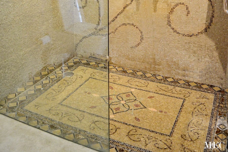 Custom Mosaics by MEC | Marble mosaic rug customized for bathroom floor.