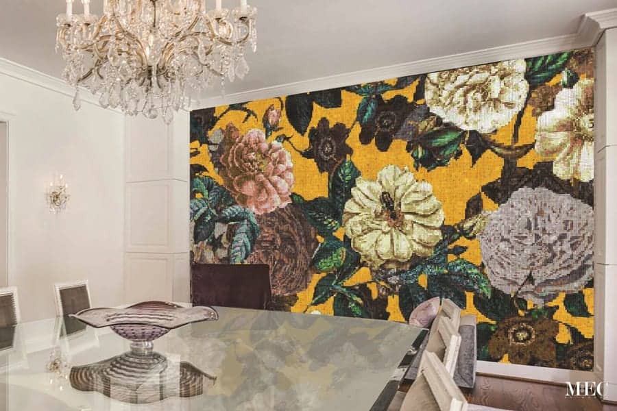 Custom Mosaics MEC | Glass mosaic mural featuring a rich mustard yellow background and floral elements
