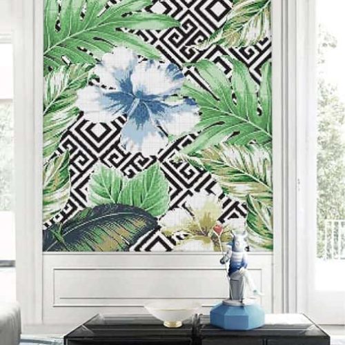 Glass mosaic wall art featuring a hibiscus and tropical leaves against a bold black and white Greek Key background by MEC.