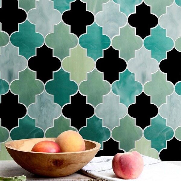 CHAIMA. Product image showing Jade Glass waterjet cut tiles from Marrakesh collection. Custom TRELLIS Arabesque Moroccan tile design from MEC.