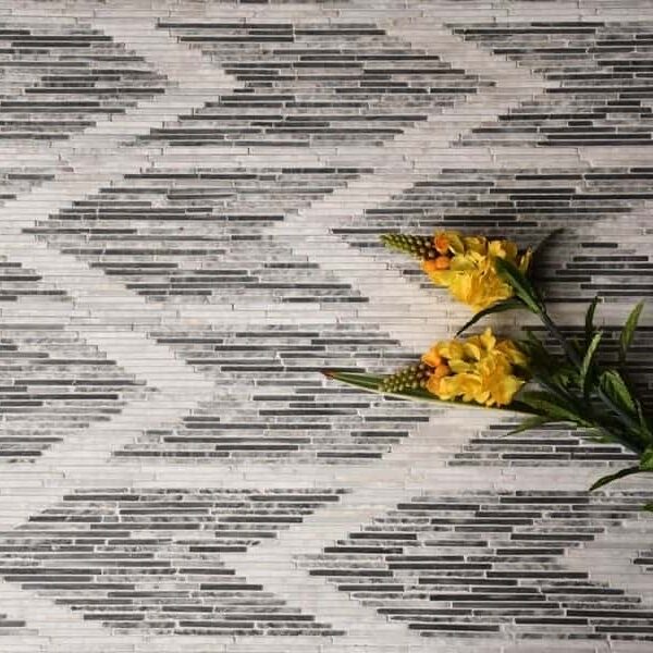 Custom Mosaics by MEC | Ikat classic chevron pattern rug features different shaded tiles strips of the same colored marble stone.