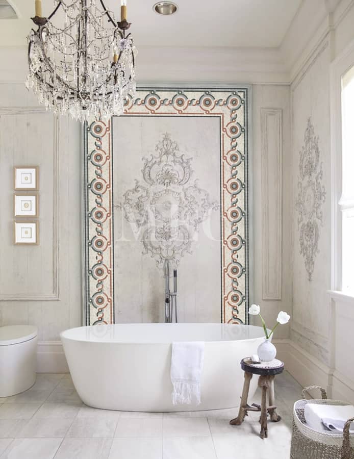 Custom handmade marble mosaic with border installed in a master bath wall