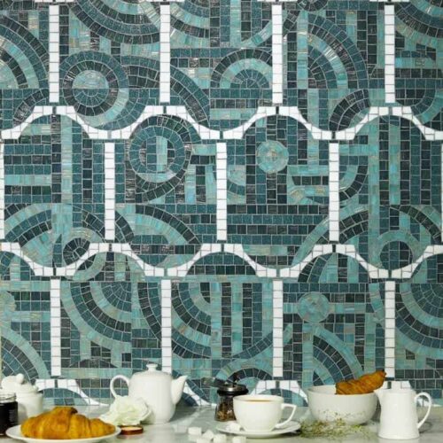 Trullo turquoise and white handmade glass mosaic pattern from Decoratifs catalog by MEC. ombines symmetry of a tile pattern with asymmetry of geometric abstract art