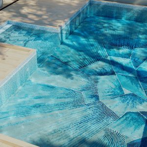 This image is showing a custom made Skiss Aqua Vertex PIXL glass tile swimming pool mosaic by MEC 3D render