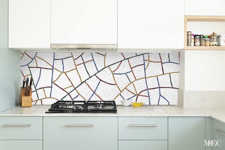 Decorative handcrafted mosaic tile backsplash art featuring abstract colorful lines