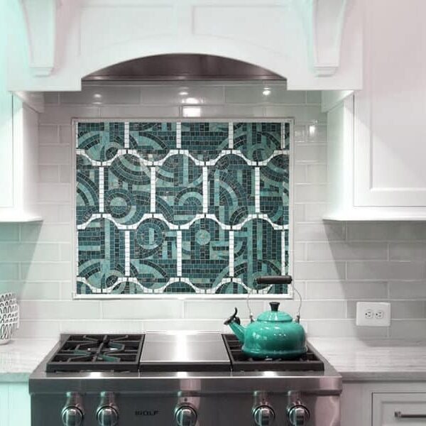 Decorative handcrafted mosaic tile backsplash art featuring asymmetry within symmetry