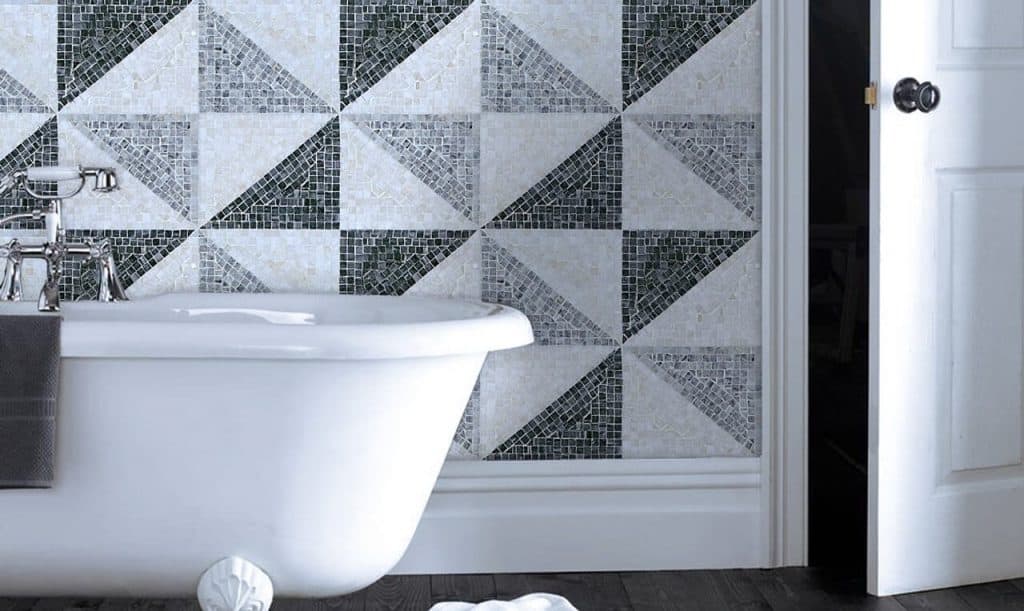 Maraic marble mosaic monochrome geometric pattern shown on a bathtub wall