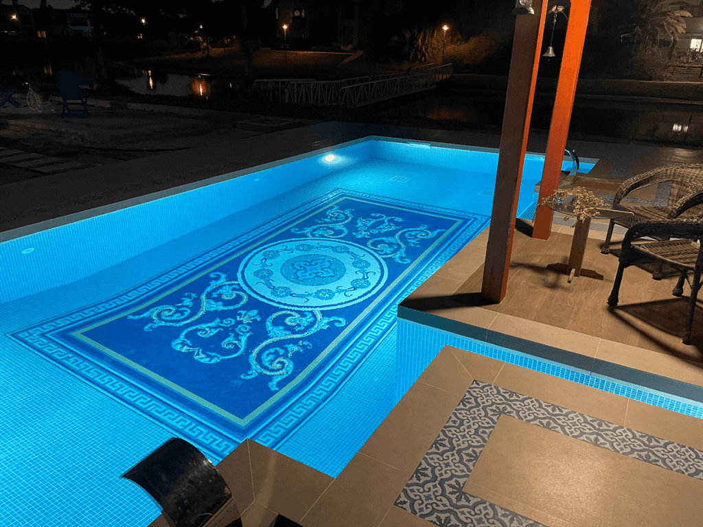 Dubai VIlla Custom glass mosaic tile medallion centered swimming pool motif by MEC night time