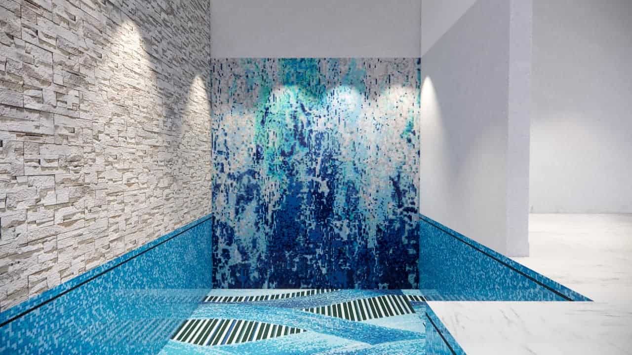 This image is showing Our Miran design- an aqua blue pixelated pool mosaic pattern with all art