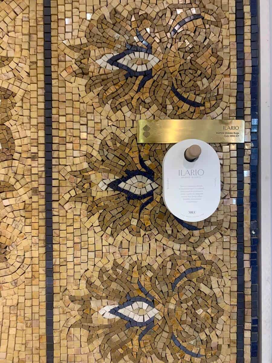Ilario | Marble mosaic flooring rug border close up