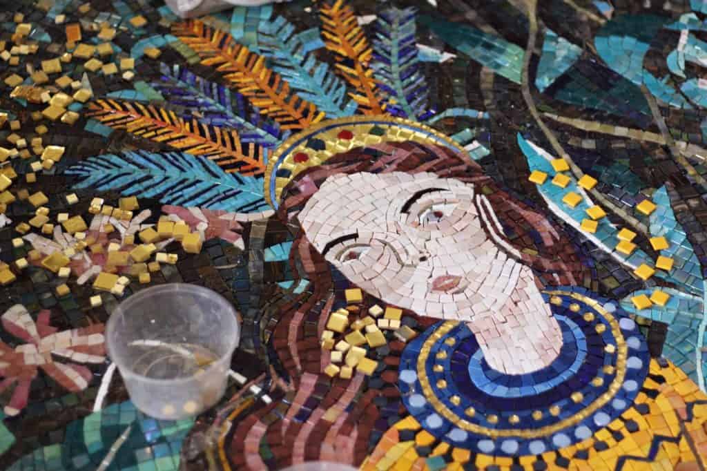 close up of a handcrafted mosaic artwork tile mural in the making
