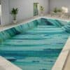 This image is showing a personalized mosaic glass tile PIXL and abstract watercolor art pool
