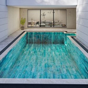 This image is showing designer made pool mosaics art for small outdoor swimming pool PIXL