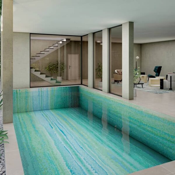 This image is showing an abstract art green, aqua and blue palette PIXL glass customized mosaic swimming pool tiles