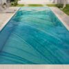 MEC Glass Mosaic Pool with turquoise water. Modern, luxurious, and bespoke mosaic design.