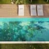 Modern rectangular pool with a vibrant turquoise and green abstract mosaic.