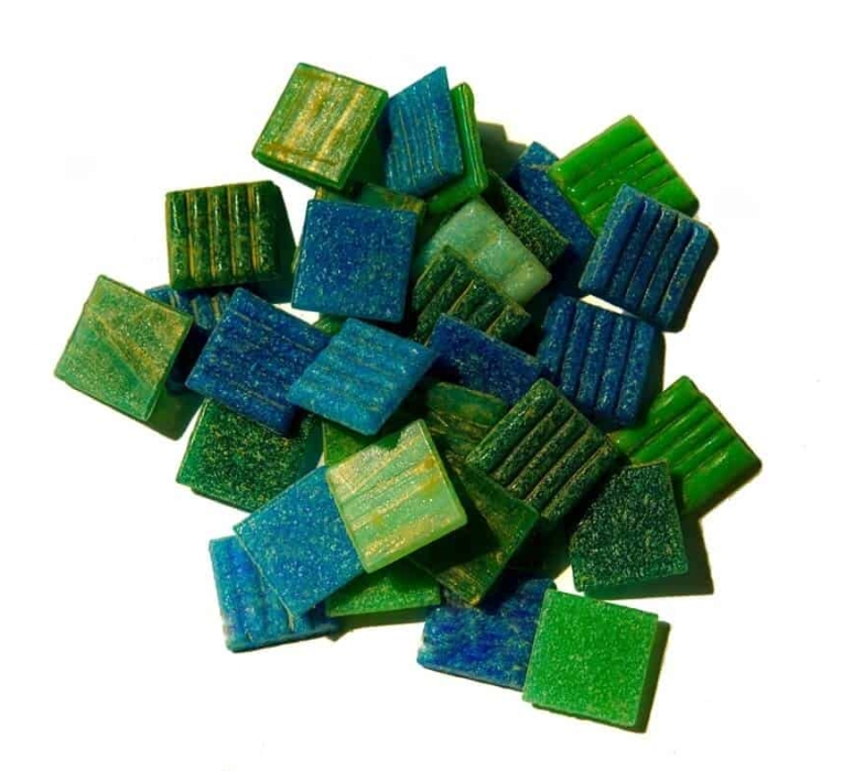 a small pile of blue and green vertex glass mosaic tile mix on a white background