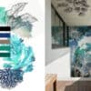 Artistic mosaic wall with aquatic botanical theme and ceiling mural, beside modern wooden deck patio.