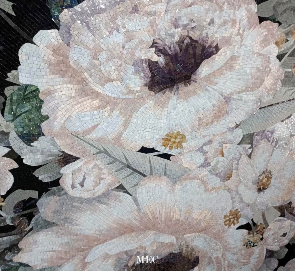 Intricate floral mosaic artwork featuring blooming peonies in soft shades with detailed petal and leaf patterns.