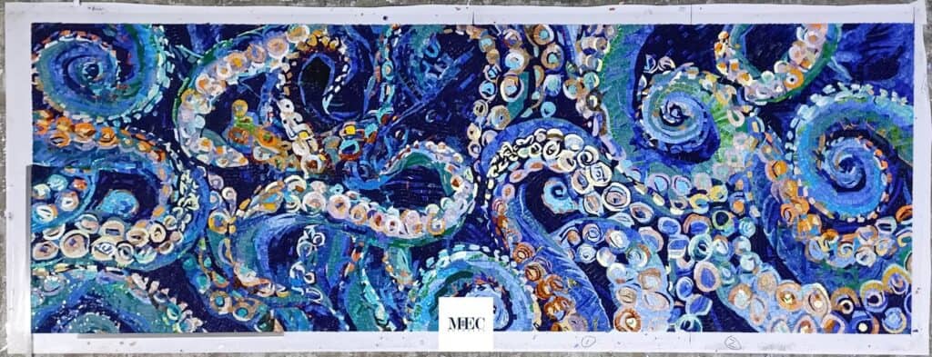 complete octopus mosaic art mural at the workshop