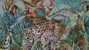 Mosaic of a detailed leopard amidst tropical foliage, showcasing vibrant greenery and floral tile artistry.