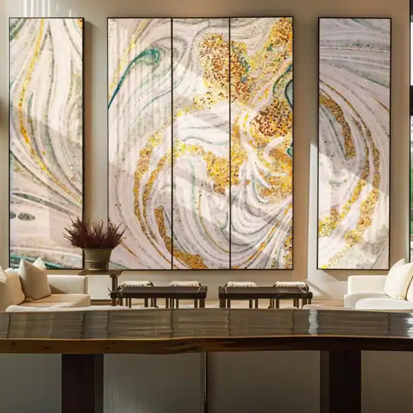 Multi-panel mosaic wall mural with swirling abstract patterns in white, gold, and soft green tones, installed as a feature wall in a tall living room interior.