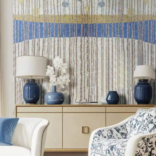 Abstract mosaic wall featuring vertical striped patterns in soft neutrals with blue and gold accents, adding texture and elegance to a modern living space.