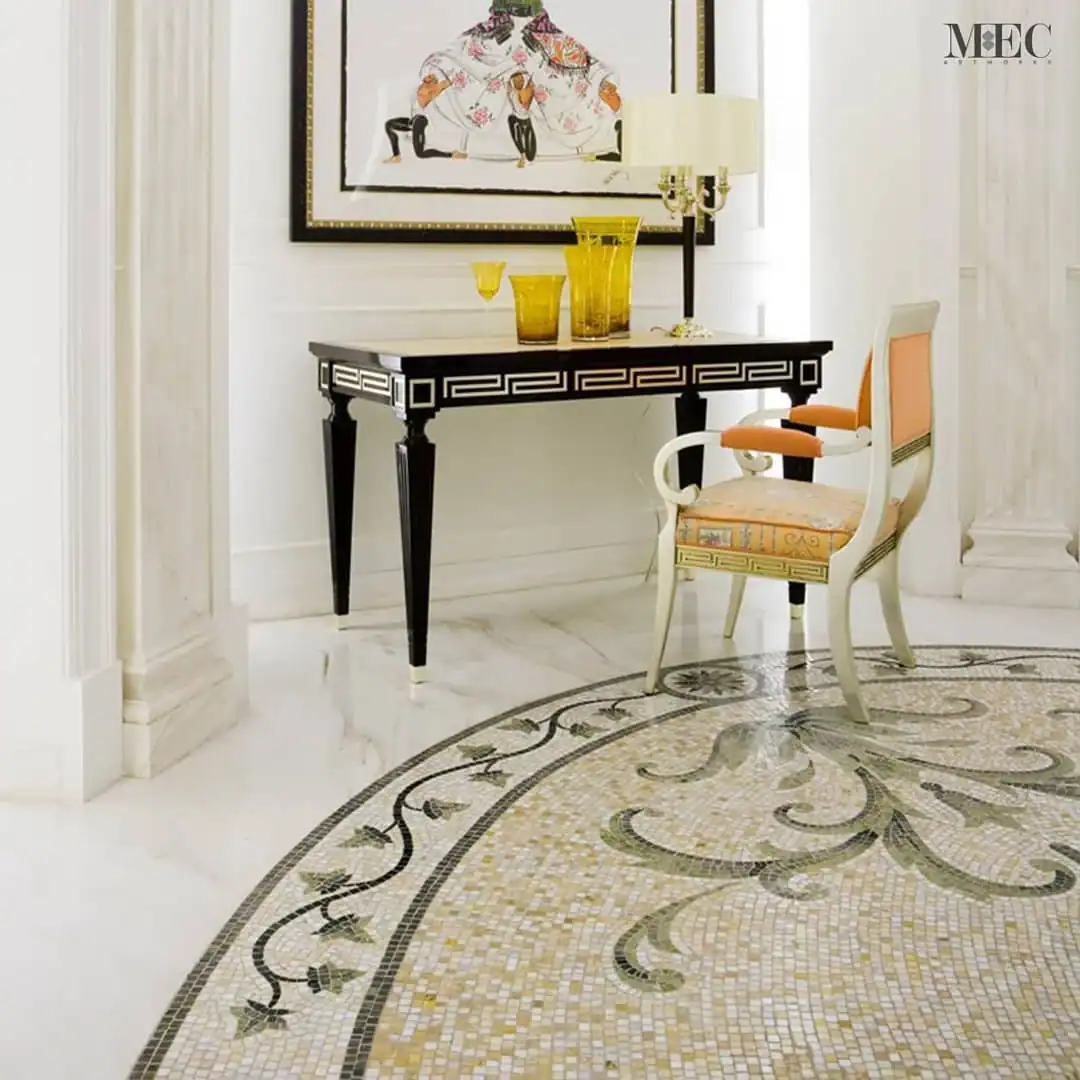 Elegant circular floor mosaic with floral vine patterns in soft beige, green, and gold tones, designed as a timeless ornamental rug tile.