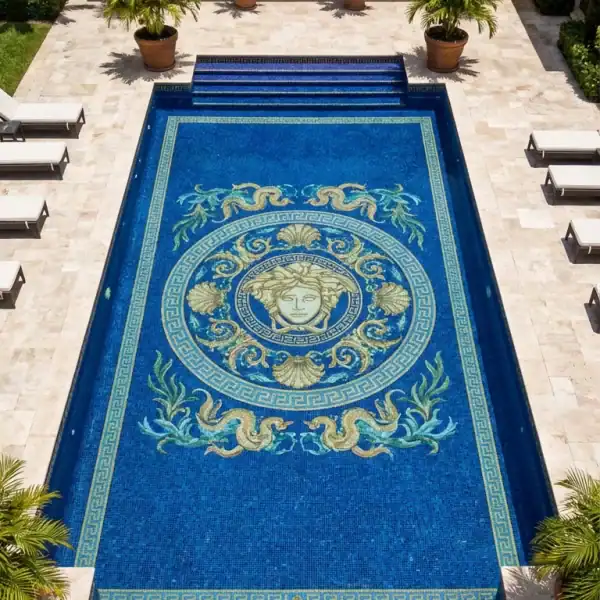 Luxury blue pool mosaic with Medusa face medallion, Greek key border, shell and scroll motifs in gold and green tones on royal blue tiles.