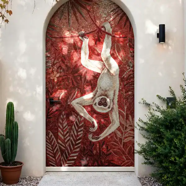Crimson Canopy Mosaic Wall Crimson Canopy Wildlife Mosaic used as an arched exterior entry feature wall with handcrafted monkey and tropical foliage design.