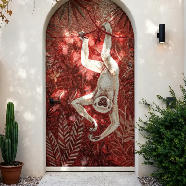 Crimson Canopy Wildlife Mosaic used as an arched exterior entry feature wall with handcrafted monkey and tropical foliage design.