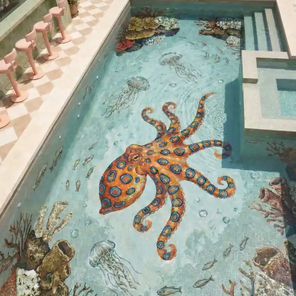Artistic Octopus Pool Mosaic Installation octopus mosaic pool design with marine life, coral and fish in vibrant ocean colors, ideal for luxury swimming pools and resort style outdoor spaces