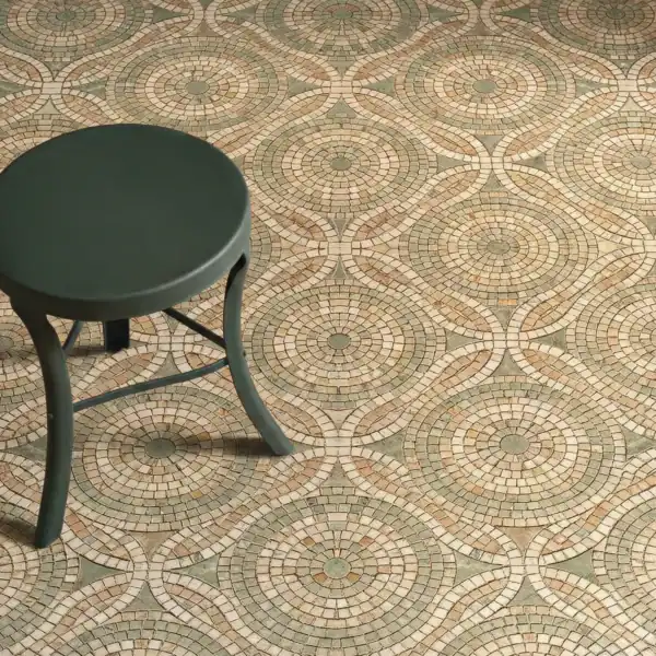 The Astral Weave circular geometric mosaic floor pattern in neutral tones with radial stone tiles, ideal for luxury interiors, bathrooms, and elegant flooring designs