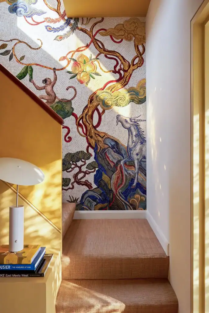 mosaic mural featuring fantasy creatures, flowing vines, and handcrafted artistic storytelling in elegant interior