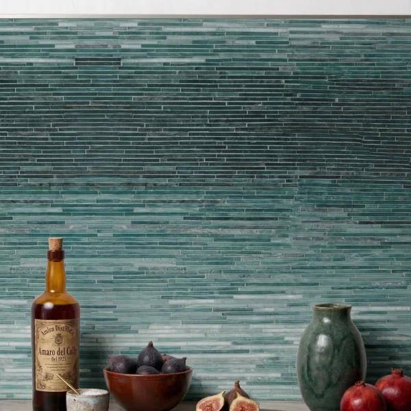 Deep Sea Ombre Linear Mosaic emerald green and teal linear glass mosaic backsplash with gradient tones in modern luxury kitchen and dining interior